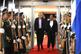 Austrian and South African presidents shaking hands